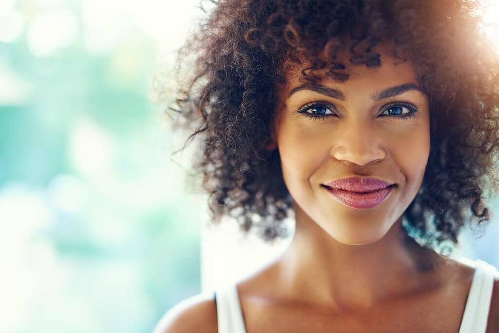 Smiling woman learns about purging disorder facts